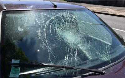 Satisfying video shows how a cracked glass windshield is repaired