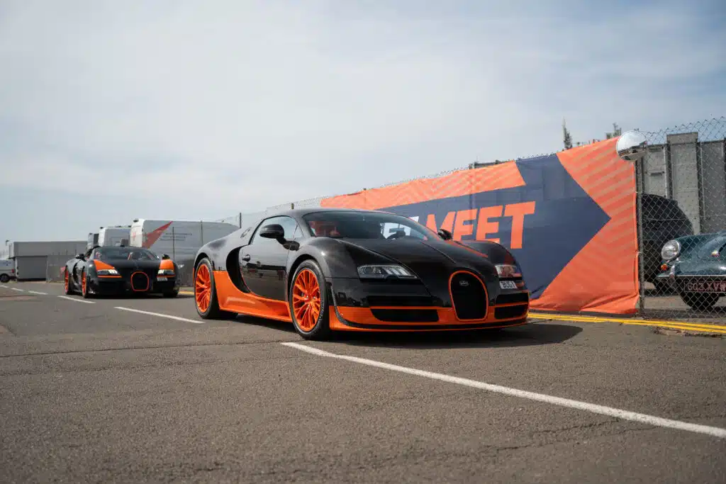 The 2025 supercar meet at Silverstone Circuit featured a rare hypercar lineup, including a Bugatti Veyron tribute, with over $1B in cars on display