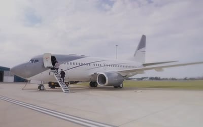 Inside this Boeing Business Jet featuring a king-sized bed and ensuite in the sky