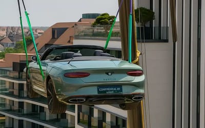 $420k Bentley craned to rooftop of Michelin-starred chef's restaurant for unique dining experience