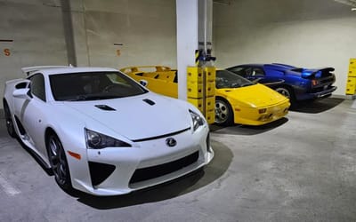 Man confused by why there's a garage full of supercars, from Ferraris to Lamborghinis, at a Wyoming hotel