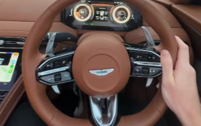 Aussie car guy grabs his dad from the airport in an Aston Martin DB12, Bond-style