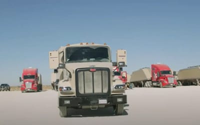 Autonomous 18-wheelers in Texas move across harsh desert terrain with no safety drivers