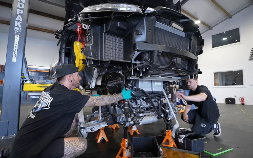 Aston Martin DBX with seized engine from flood damaged car now undergoing a complex engine rebuild after teardown revealed extensive internal damage