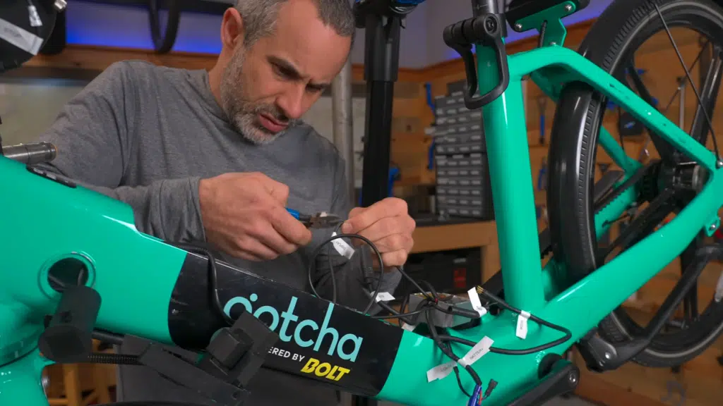 A man buys a fleet eBike on Facebook Marketplace for $75 and revives it using a new motor controller, pedal assist system, and DIY tools