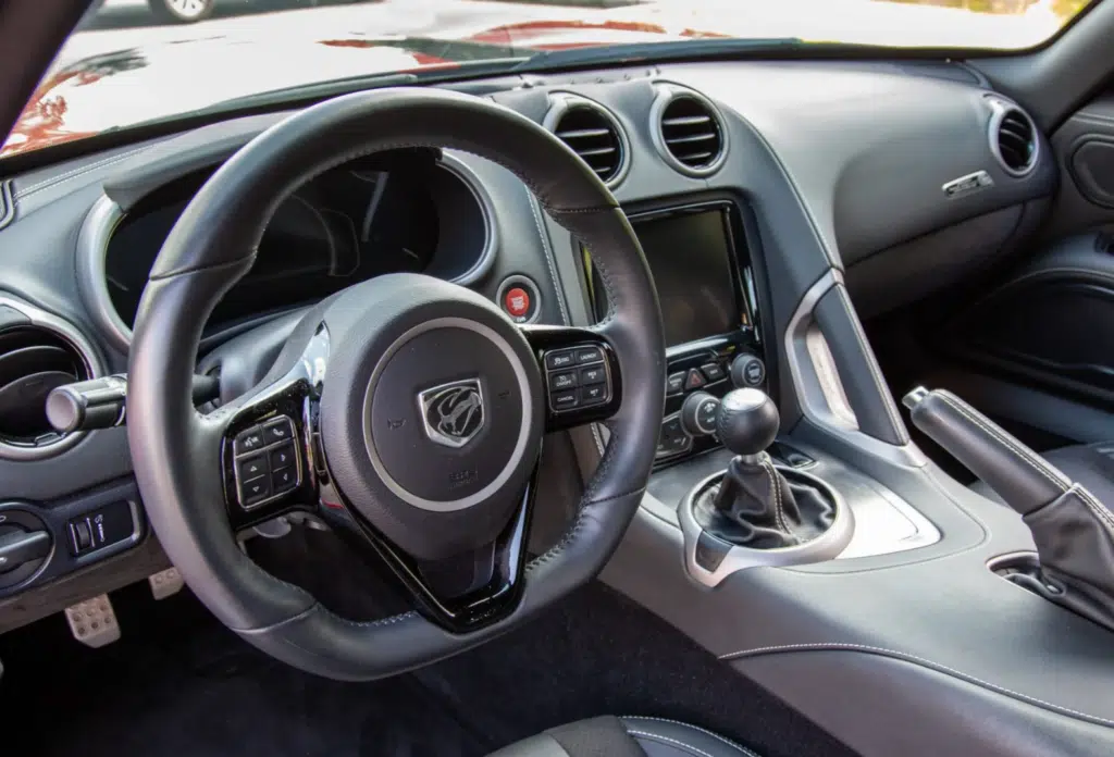 A Dodge Viper with a V10 engine and 12,000 miles just sold at auction for $169,000, proving demand for used performance cars is stronger than ever